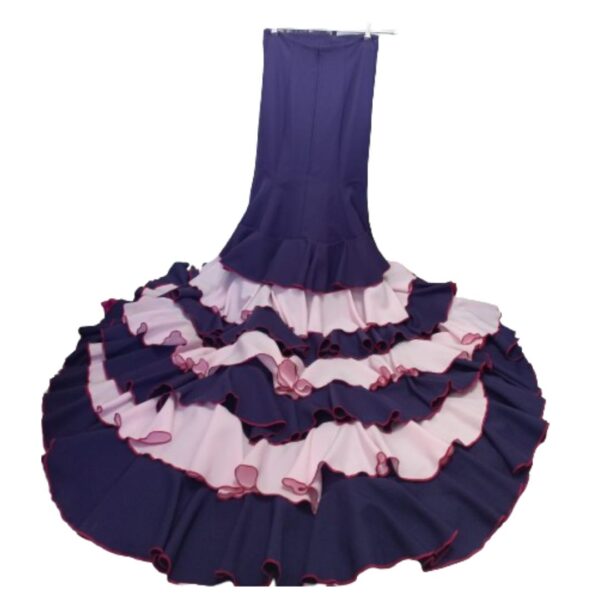 Falda de flamenco con colín desmontable. Unidos por cremallera. Material strech. Posibilidad de confección a medida (sin cargo). Colores a consultar.
